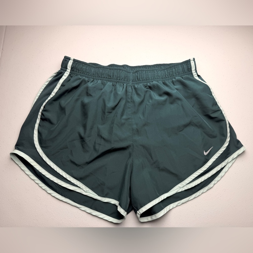 Women's Nike Tempo running shorts in a dark green color with trim Size L